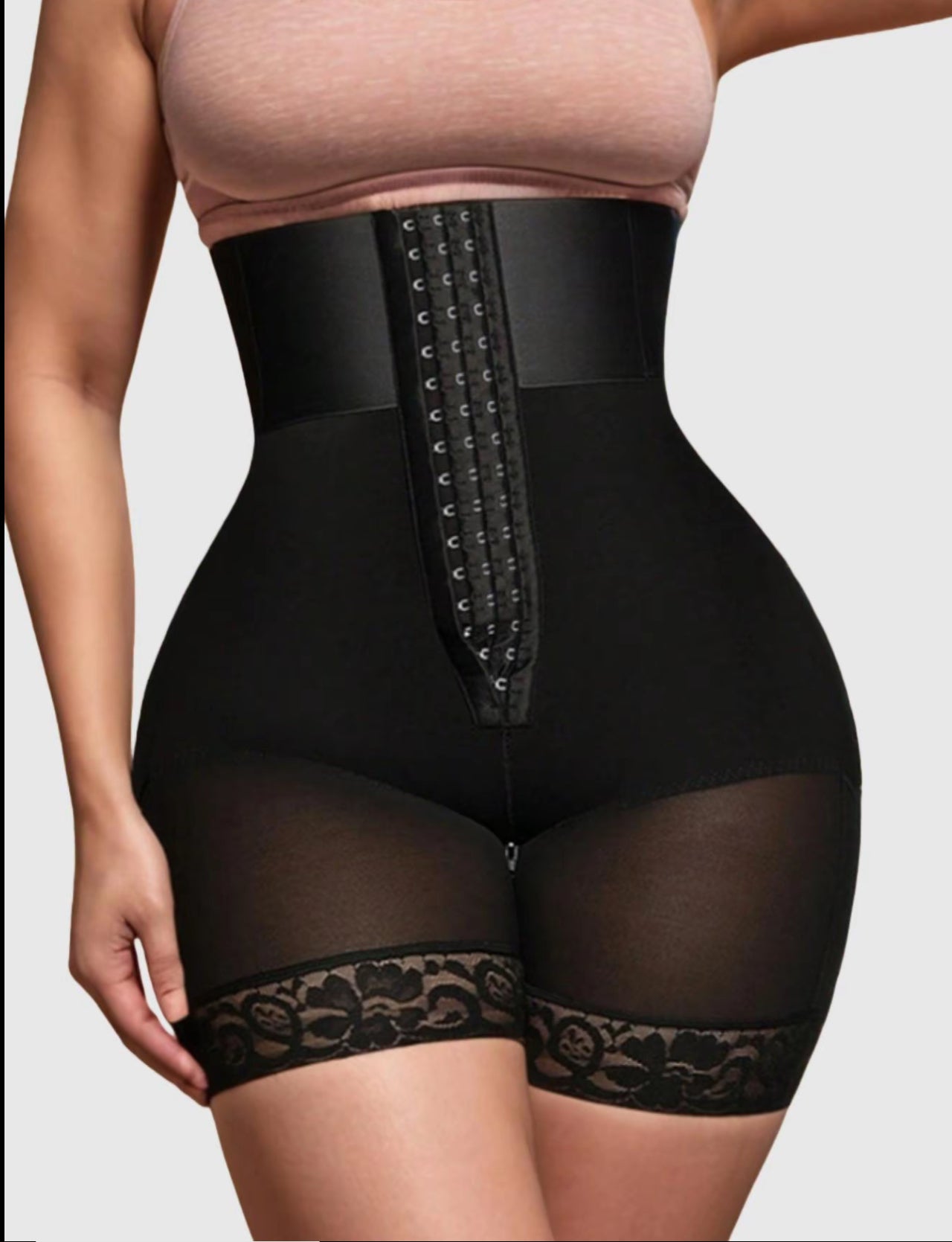 High-waisted shapewear with lace detailing by SHOVOTA, highlighting curves and providing a smooth silhouette.