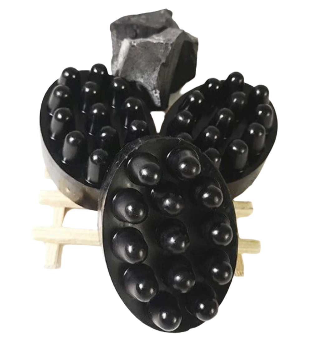 Activated charcoal soap with exfoliating sponge for deep pore cleansing by shovota, displayed on a neutral background.