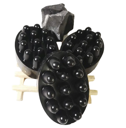 Activated charcoal soap with exfoliating sponge for deep pore cleansing by shovota, displayed on a neutral background.